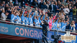 Manchester City players celebrate winning the FA Cup 2026, lifting the trophy in front of a crowd at Wembley Stadium.