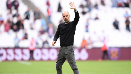 JOB DONE: Pep salutes the travelling fans at the London Stadium.