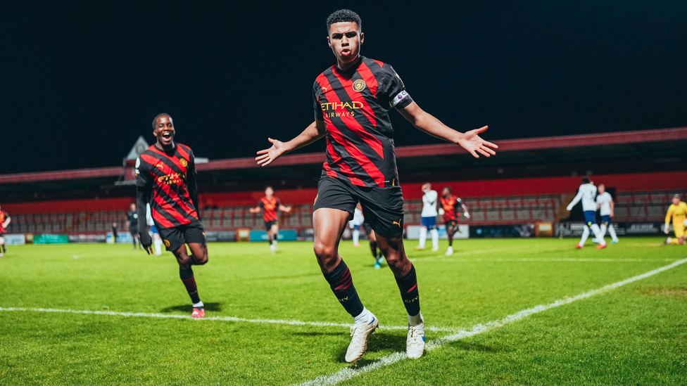 CAPTAIN FANTASTIC : Shea Charles wheels away after Brian Barry-Murphy’s side come from a goal down to beat Tottenham Hotspur