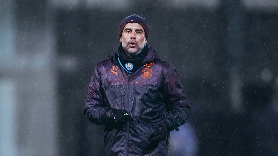 RAIN SUPREME : Pep Guardiola takes control