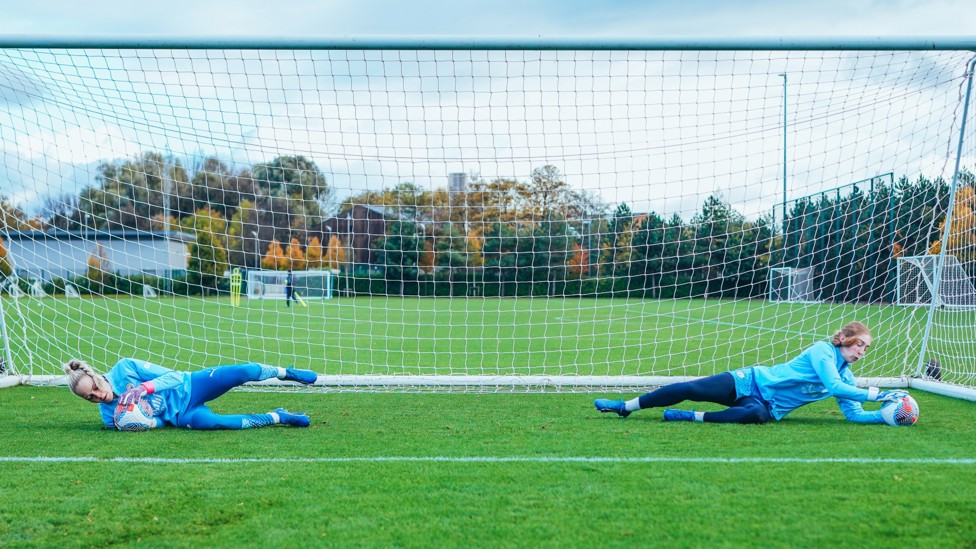 DOUBLE DIVE : Ellie Roebuck and Sandy MacIver during catching drills. 