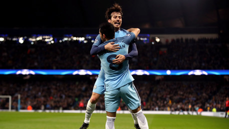 JUMP FOR JOY: Silva and Gundogan embrace after the German's strike