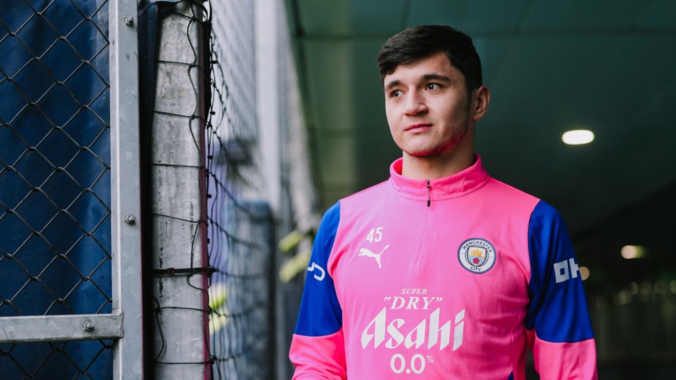 ON THE WAY : Abdukodir Khusanov walks out to the pitch