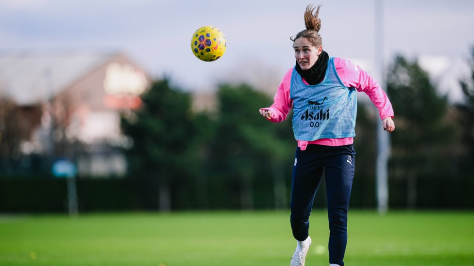 HAIR WE GO: Sydney Lohmann powers in a header.