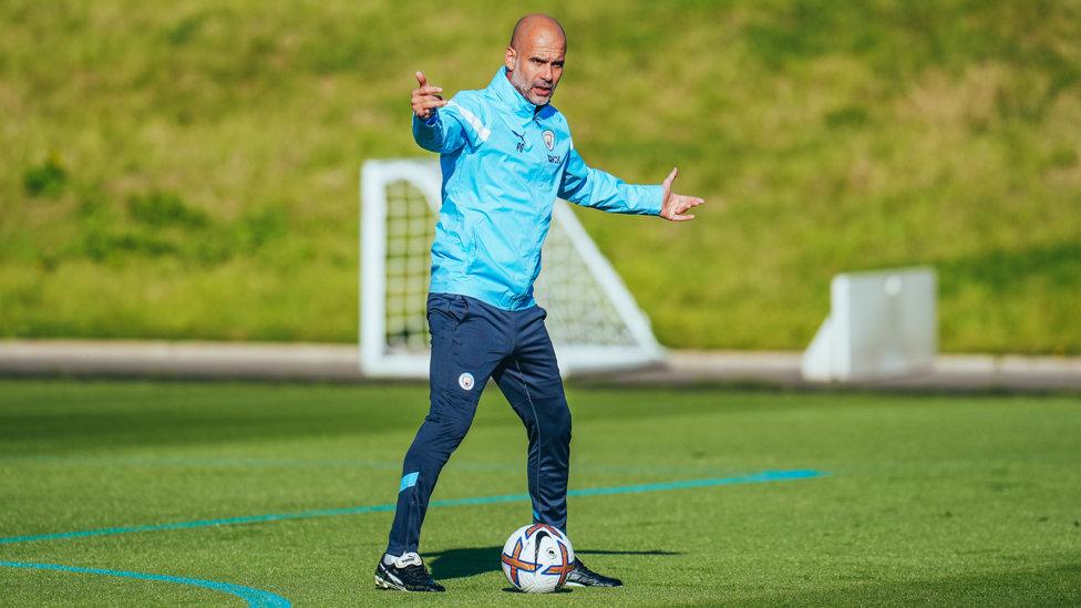 CONDUCTING THINGS : Pep Guardiola instructs his players