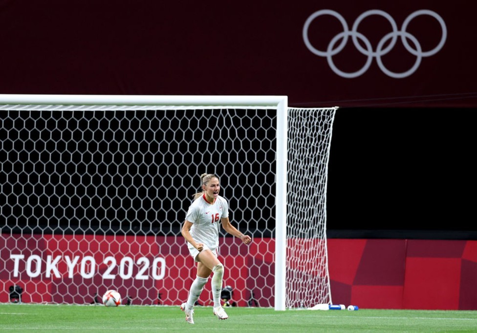 DOUBLE DELIGHT: Beckie celebrates after her second goal