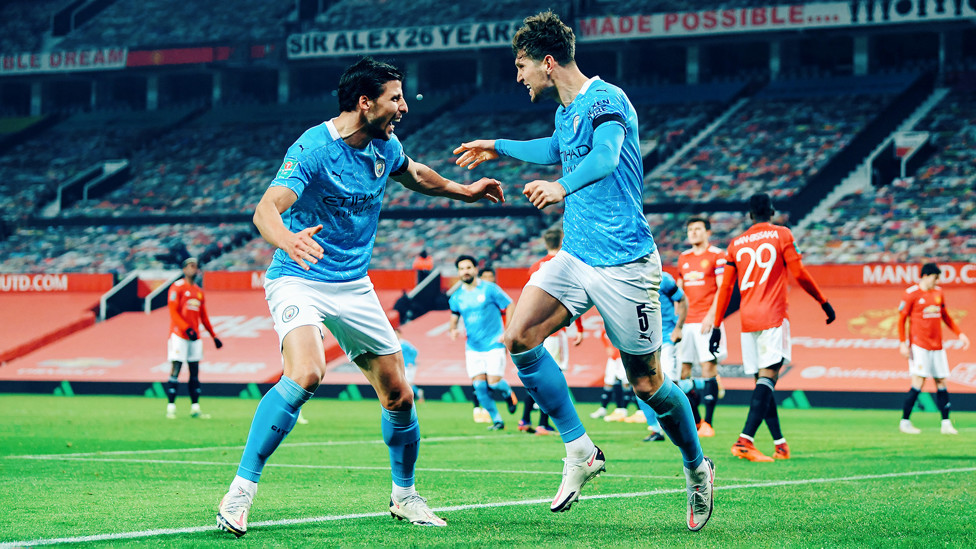 WEMBLEY-BOUND : John Stones wheels away in celebration having given City the lead in our 2-0 Carabao Cup semi-final victory over Manchester United, 6th January 2021.
