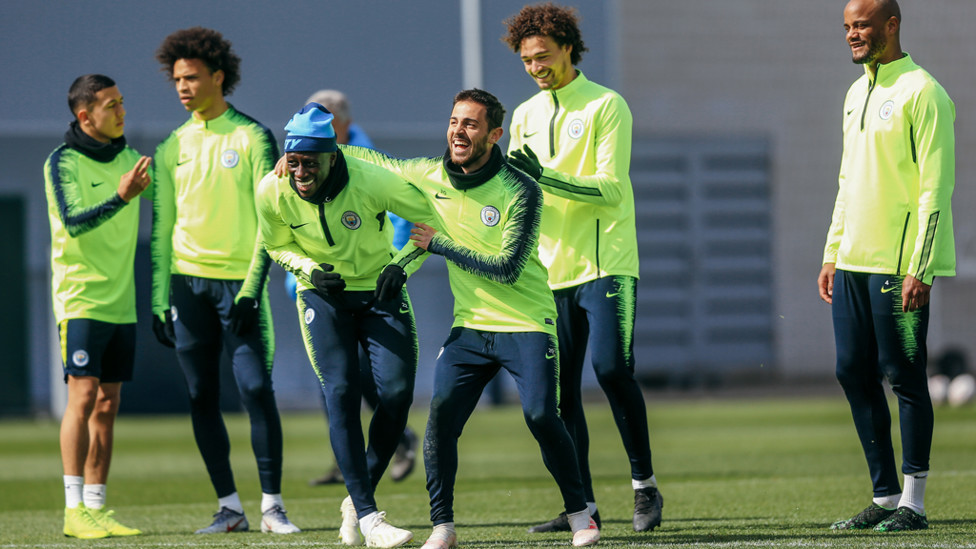 BRING IT IN : Benjamin Mendy and Bernardo Silva crack a smile
