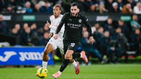 CHEEKY CHERKI: Shields the ball.