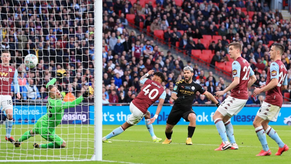 OPENER : Who else? Aguero's strike deflects into the net in the 20th minute.