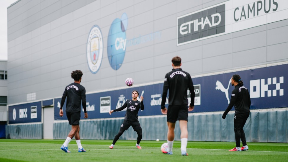 UP HIGH : Rico Lewis keeps the ball in the air