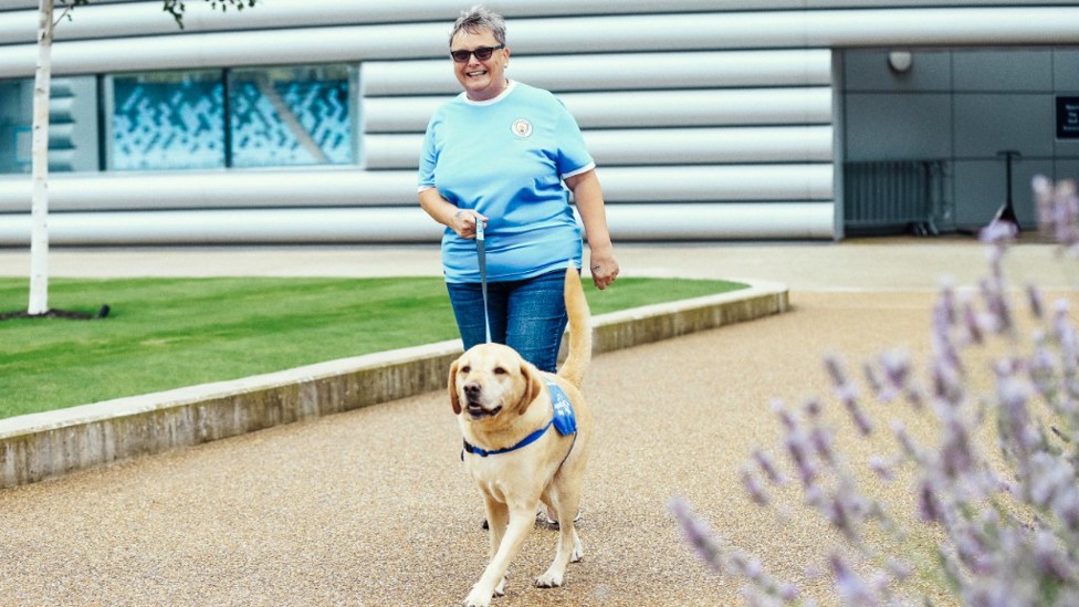 Lynn Ratcliffe and seizure alert dog, Simba.