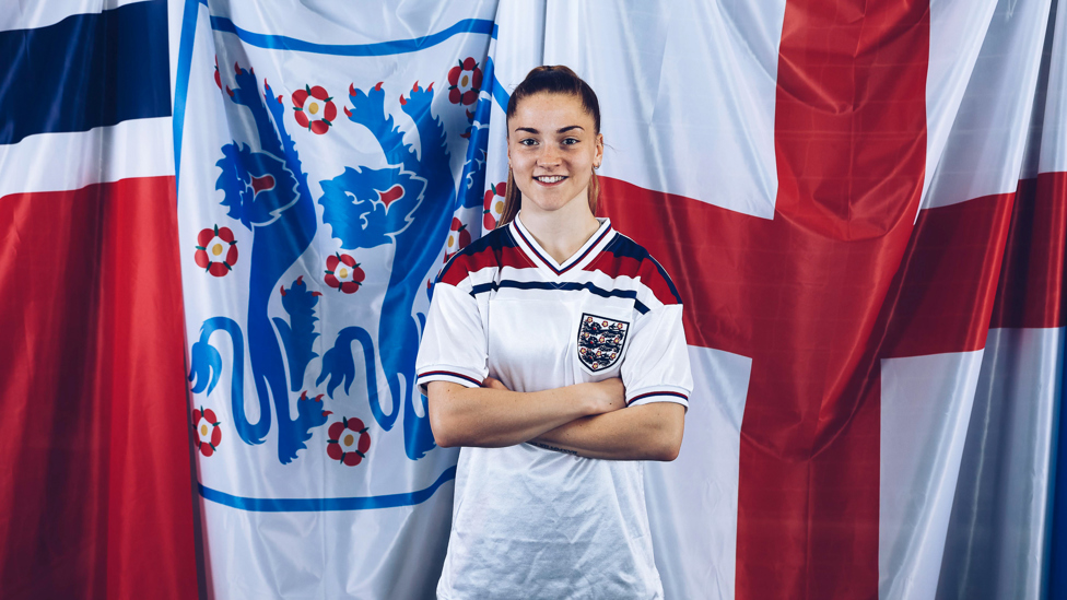 YOUNG AT ART: Exciting young striker Jess Park sports England's shirt from the 1982 World Cup!