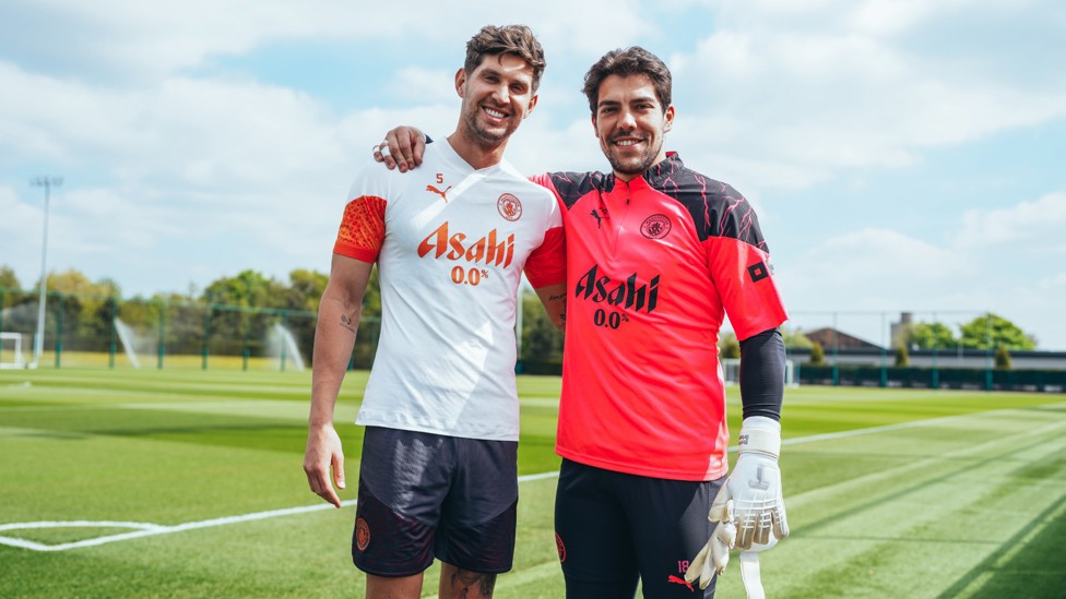 CHEESY GRINS : John Stones and Stefan Ortega Moreno give big smiles for the camera