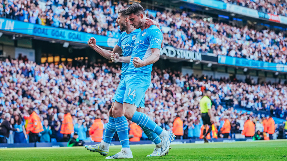 DEADLY DUO : The centre-backs clearly enjoyed that goal.