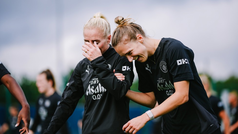 IT'S GOOD TO BE BACK: Alex Greenwood and Vivianne Miedema share a laugh