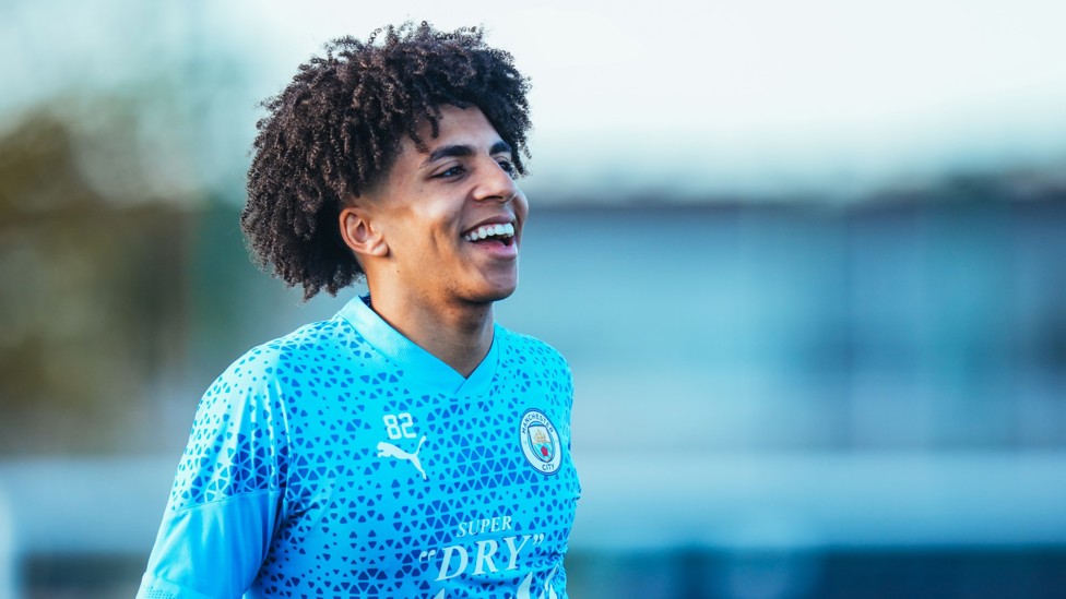 RICO'S REVELING IN IT : Lewis is all smiles