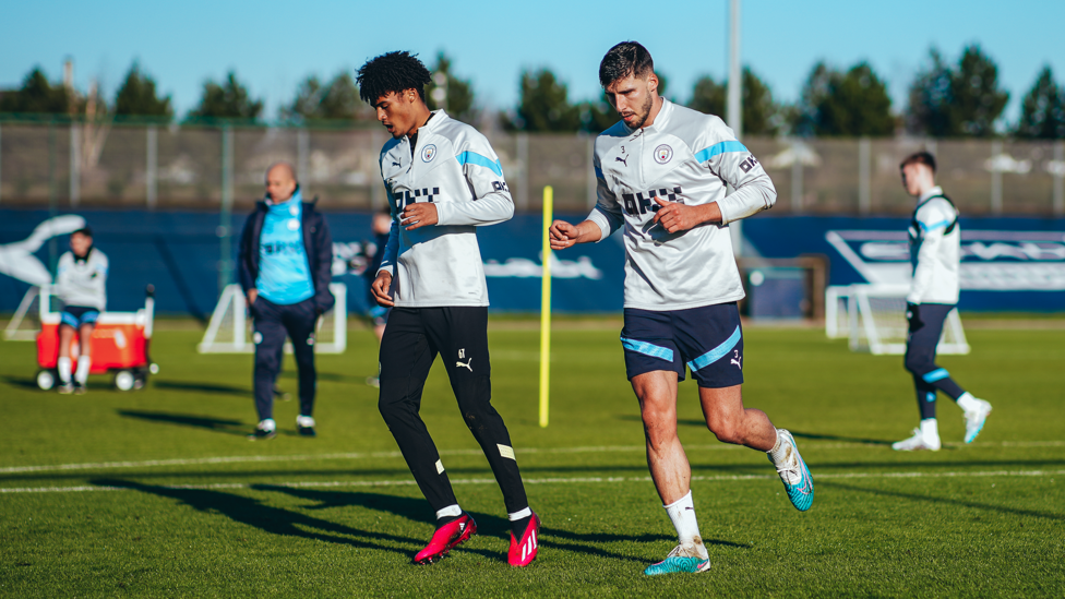 ON THE RUN: Ruben Dias puts in some fitness work alongside Kane Taylor.