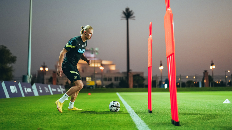 ONE ON ONE : Erling Haaland takes the ball around a statuesque opponent