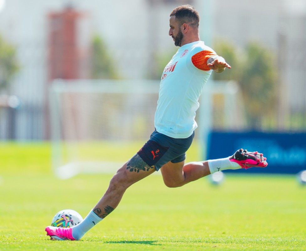 ACTION STATIONS: Kyle Walker pings in a cross.
