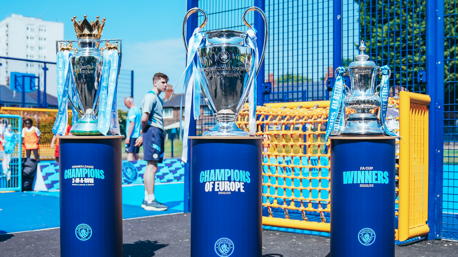 Manchester City debuts Treble trophies at Community event