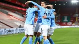 GROUP HUG: The players gather to celebrate going back ahead at Anfield!