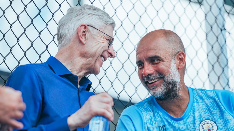 ALL SMILES : Wenger and Pep keep the conversation going