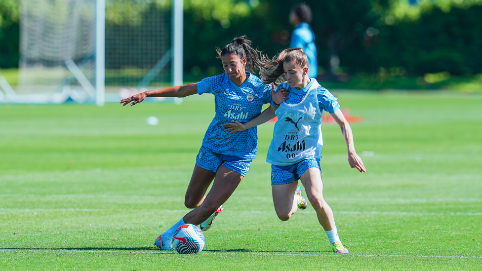 SHOULDER TO SHOULDER : Leila Ouahabi and Jess Park tussle for possession