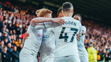 GROUP HUG: KDB feels the love.