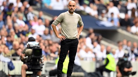 THE BOSS: Guardiola watches on from the touchline.
