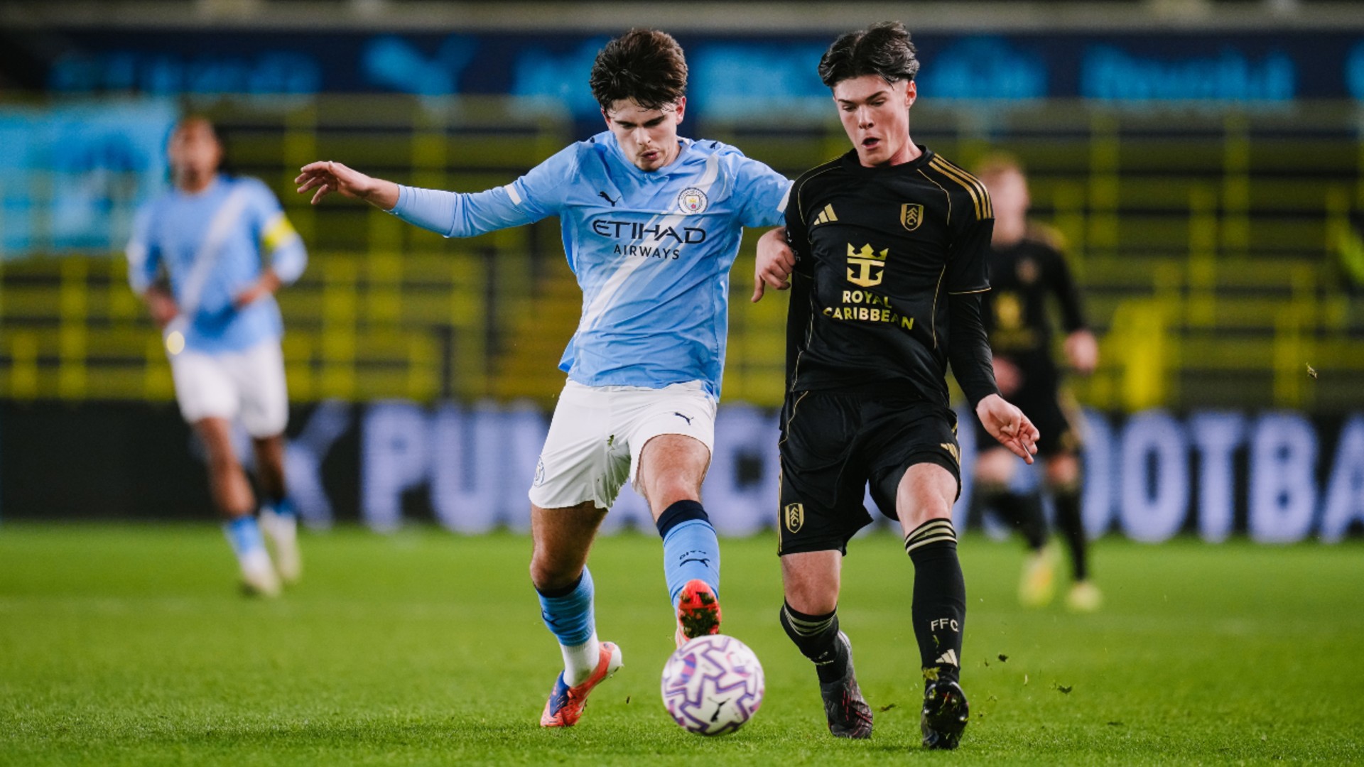 TOE-TO-TOE : Harrison Miles battles for the ball. 