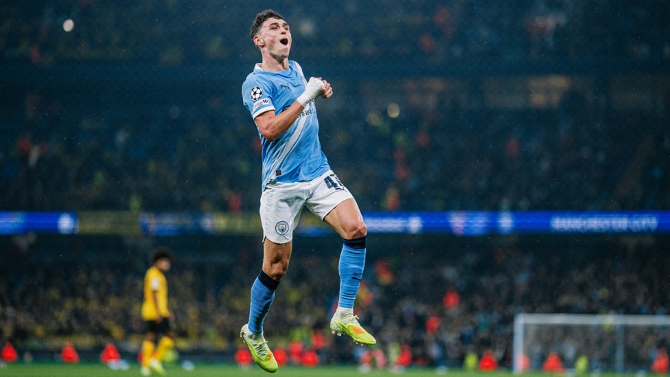 THREE CHEERS: Foden celebrates making it 3-0.
