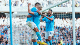 SCORER & PROVIDER: Haaland celebrates with Cancelo.