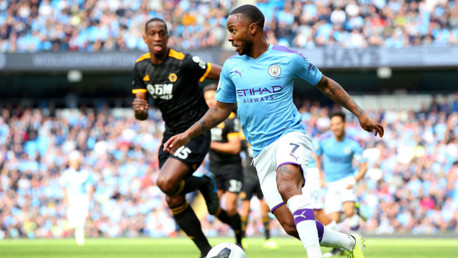 DRIBBLE: Sterling looks to unlock a rigid Wolves defence. 