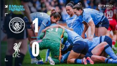 Manchester City Women's football team celebrates their 1-0 victory against Liverpool with the final score displayed on the image.