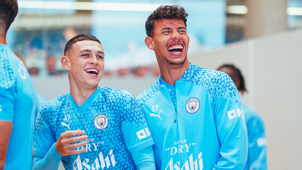 SUNDAY SMILES : Foden and Matheus Nunes spot something amusing.