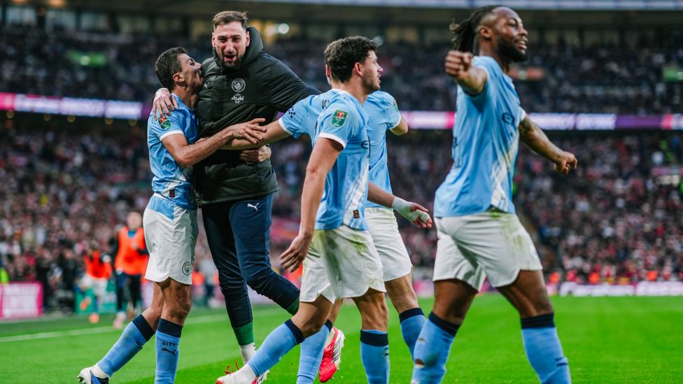 CITY CELEBRATE : Donnarumma and co celebrate O'Reilly's goals.