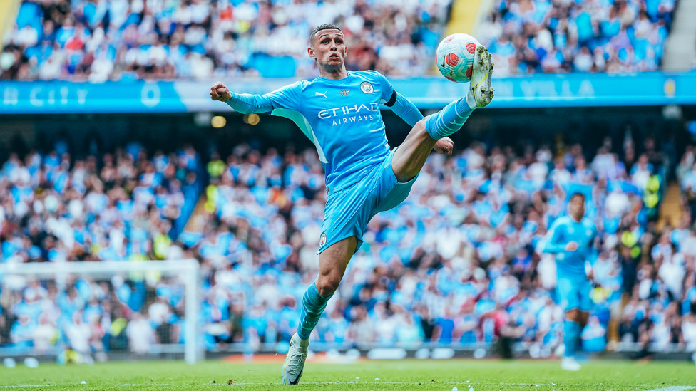 ONE OF OUR OWN: Phil Foden powers forward