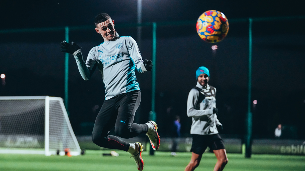 HEADY HEIGHTS : Phil Foden heads towards goal