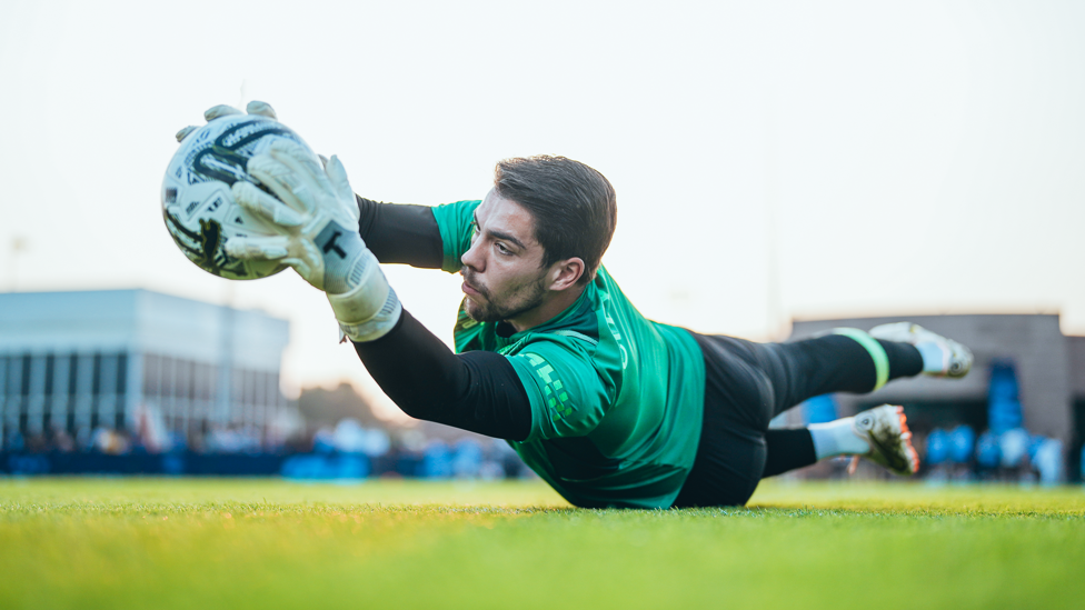 FULL STRETCH : Ortega Moreno dives to collect a ferocious attempt