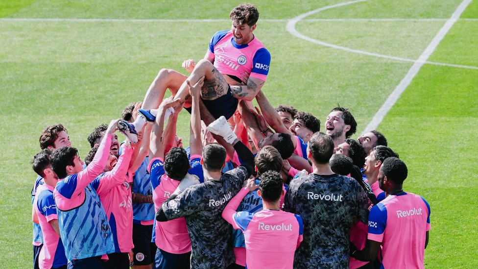 HIP HIP HOORAY : John Stones is shown a lot of love from his team-mates.