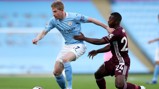 MIDFIELD MAESTRO: De Bruyne looks to escape the attention of Mendy midway through the first period.