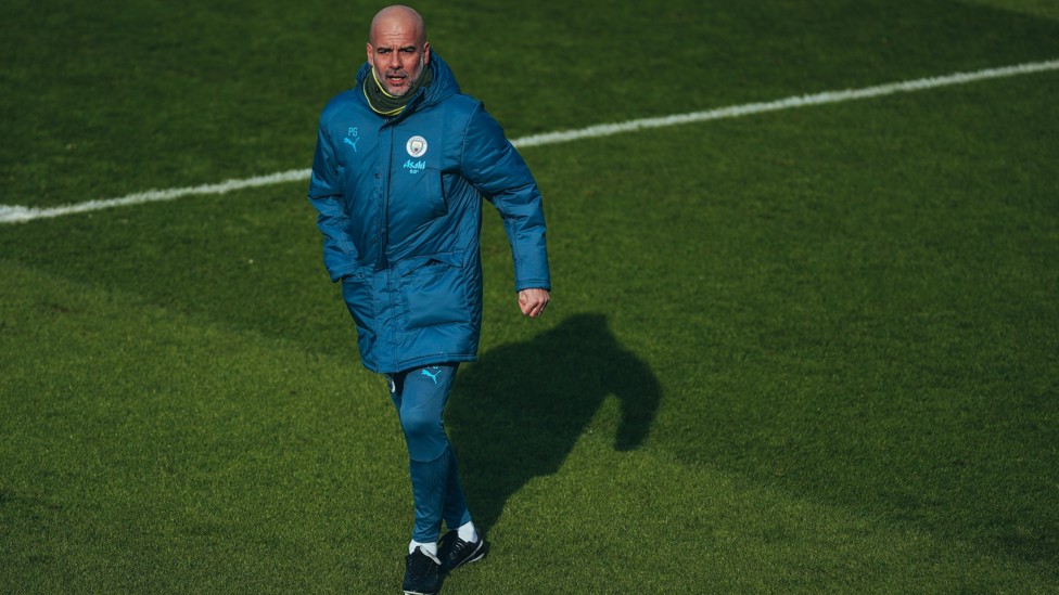 BOSSING IT : Pep Guardiola on the training pitch