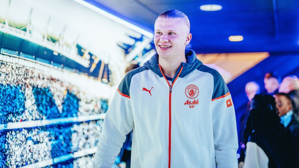 HAPPY HAALAND : Erling in good spirits when arriving at the stadium.