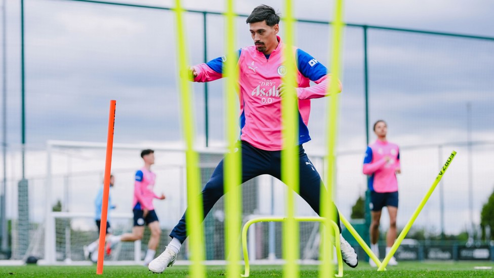 STRETCHING FOR IT: Tijjani Reijnders during today's training