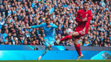 DELIVER: Walker gets the ball into the box.