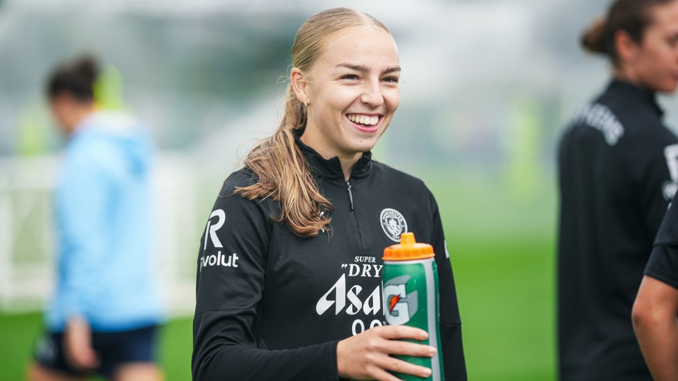 ALL SMILES : Codie Thomas takes a quick water break. 