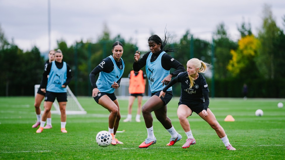 BATTLING FOR THE BALL : Bunny Shaw and Laura Blindkilde Brown fight for possession