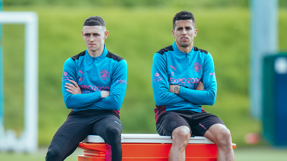 DYNAMIC DUO : Phil Foden and Joao Cancelo watch on