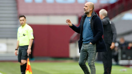 THE BOSS: Pep Guardiola gets his point across to the City players